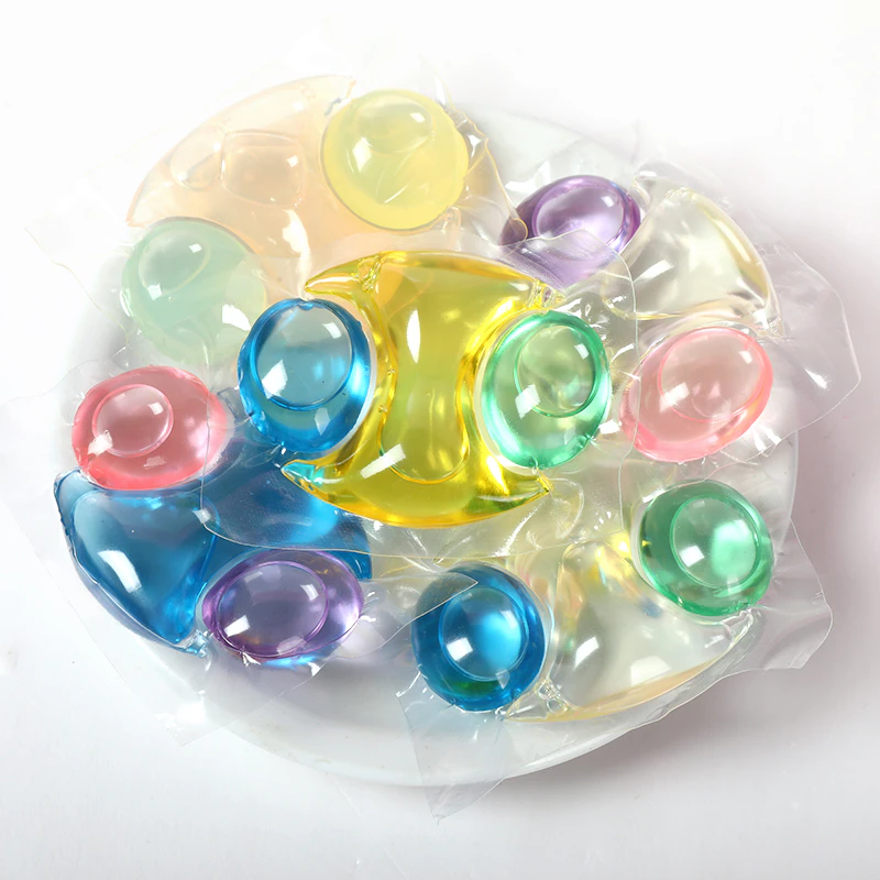 Application of water-soluble film on laundry pods