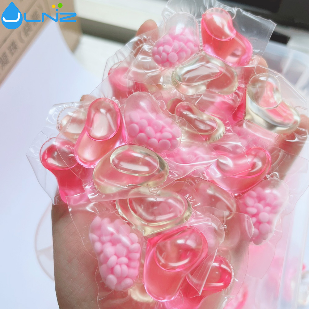 Jingliang 3 in 1 hot selling OEM laundry washing capsules Sakura fragrance laundry detergent pods manufacturer